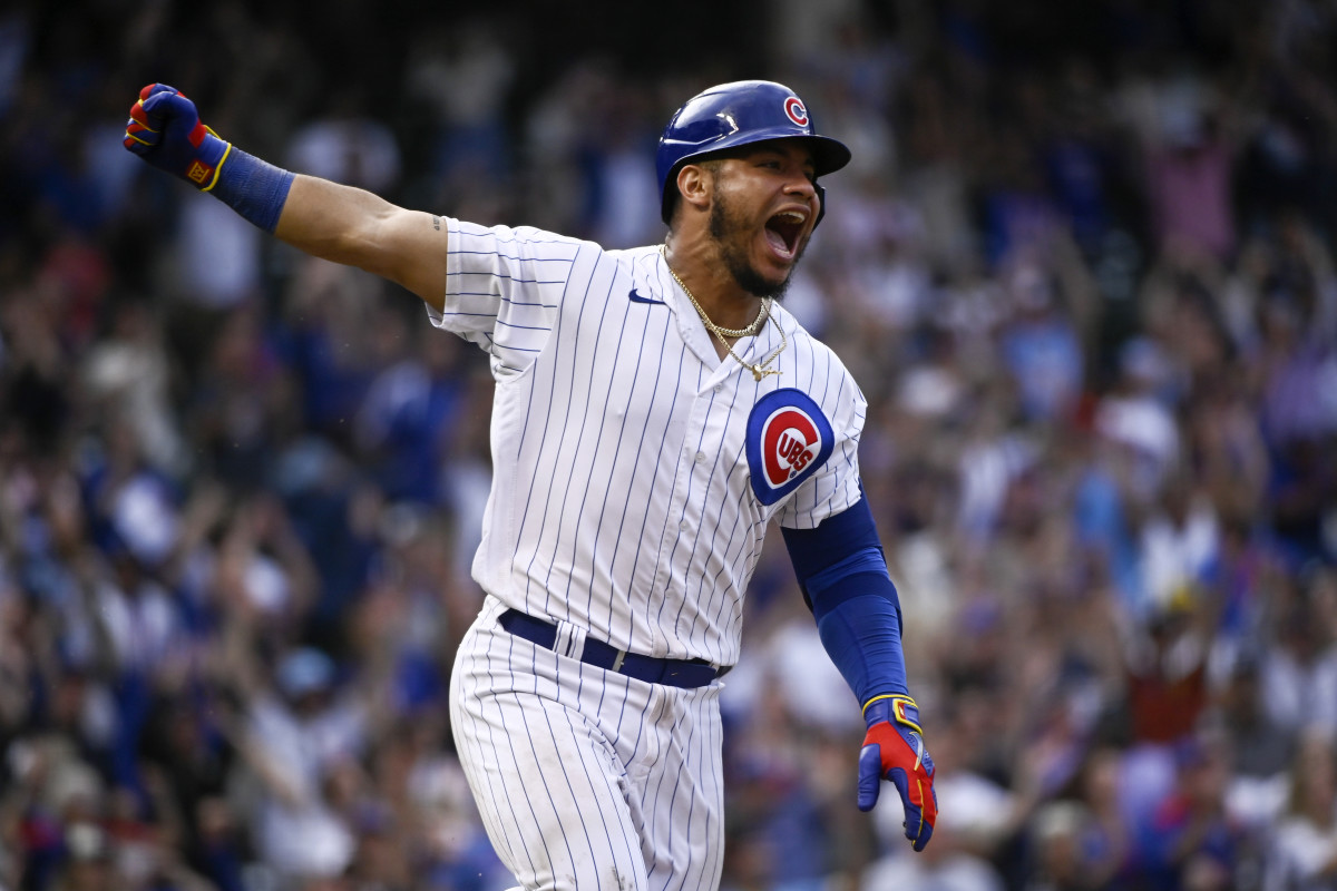 Former Cubs catcher Willson Contreras reacts after hitting a walk-off single.